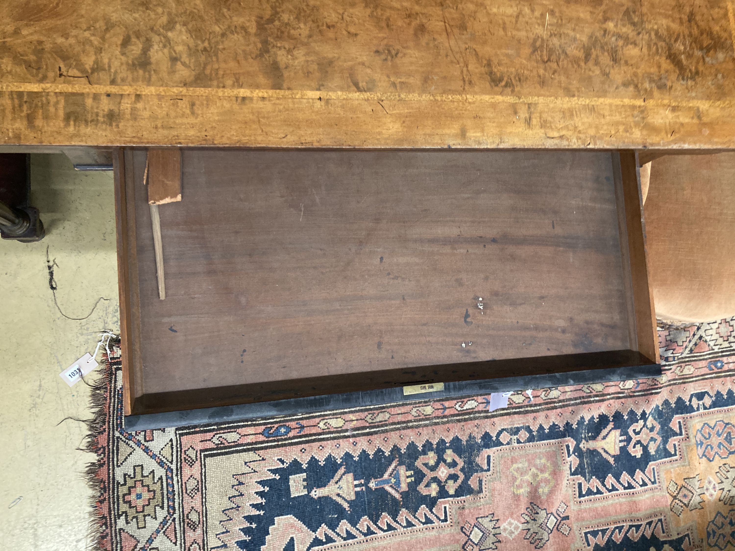 A Regency banded and ebony inlaid walnut writing table, width 106cm, depth 52cm, height 73cm